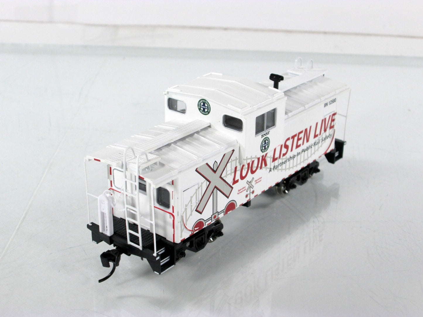 HO Scale **BNSF - Mexico** Operation Lifesaver Caboose, BN 12580 - Athearn 75236