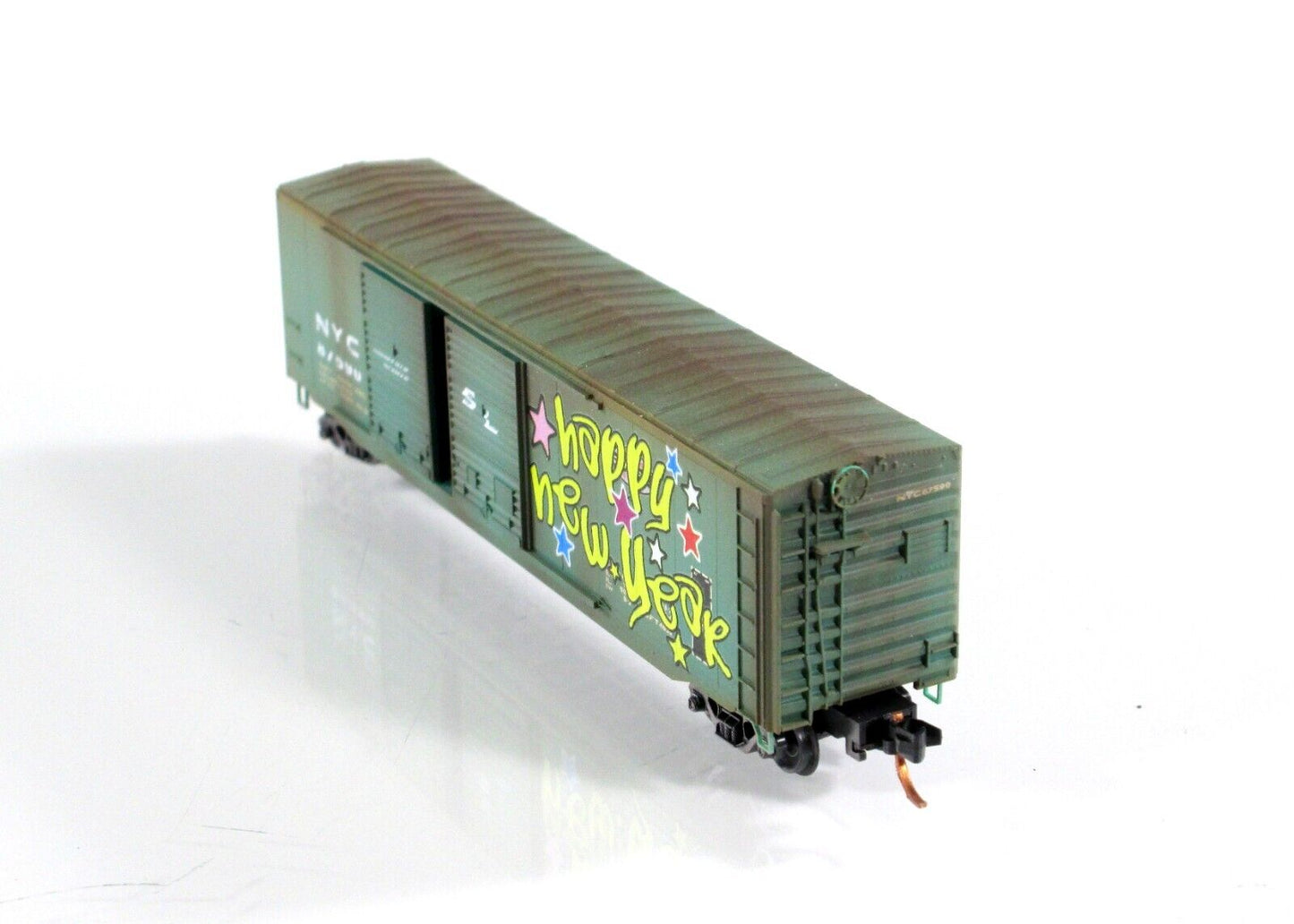 N Scale ****NYC   HAPPY NEW YEAR**** Graffiti Box Car --- Micro Trains 03744110