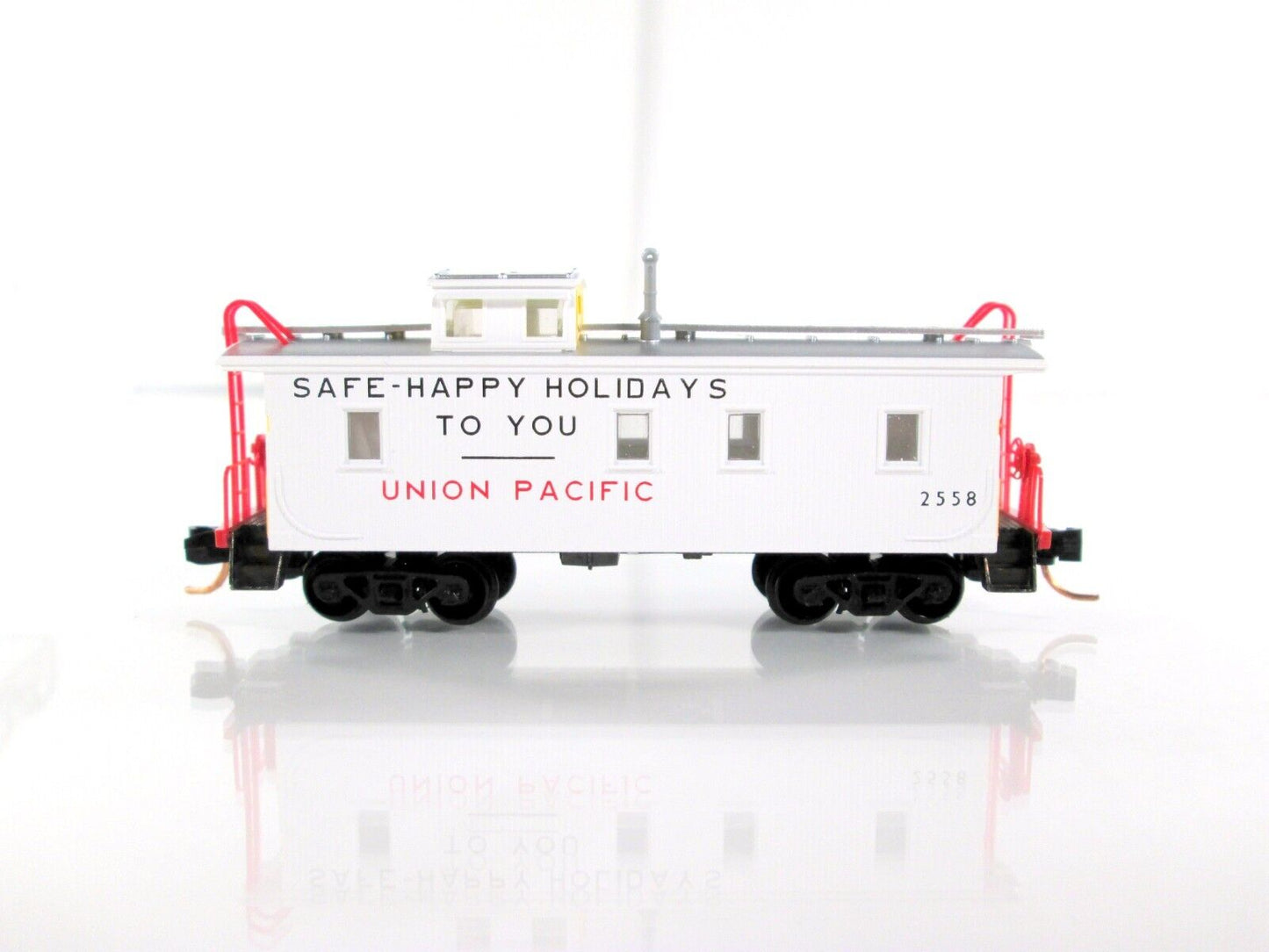 N Scale Union Pacific *SAFE-HAPPY HOLIDAYS* Caboose #2558 -Micro Trains 05000170