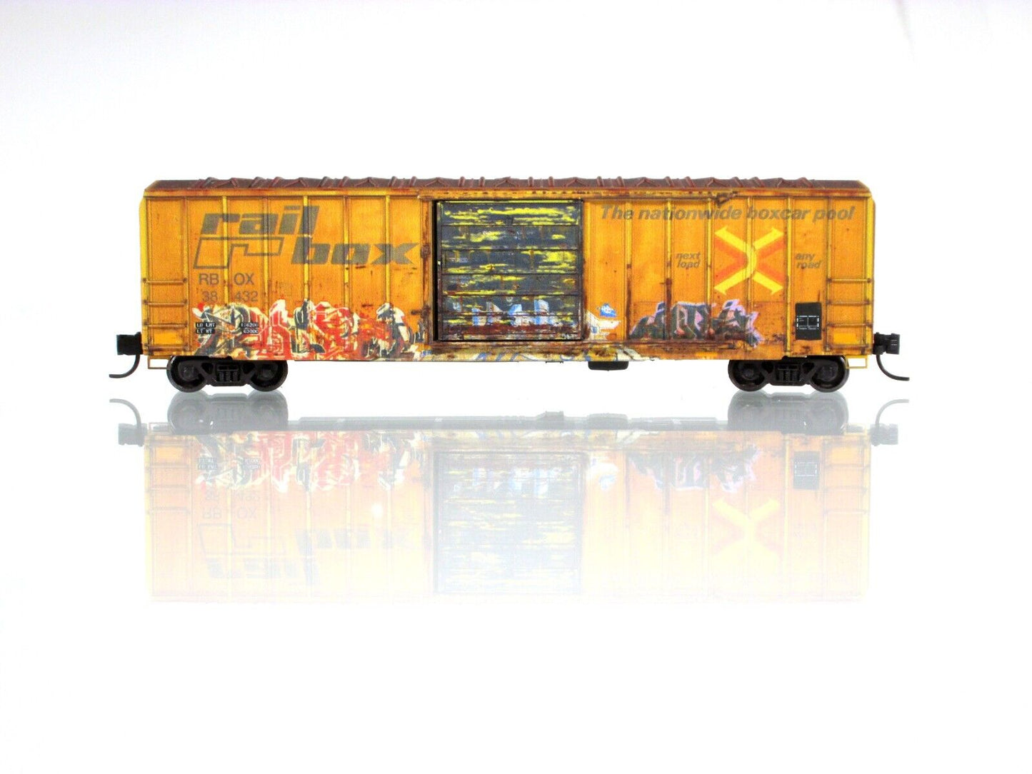 N Scale RAILBOX  **Tell A Joke Day**  GRAFFITI Box Car - Micro Trains 02545013