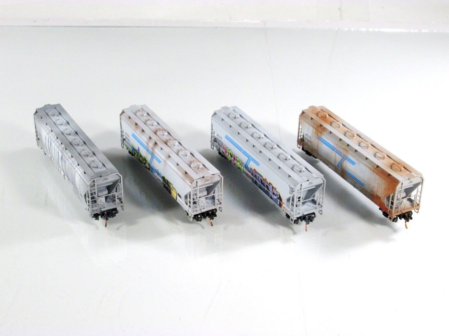 N Scale **ACFX** Weathered & Graffiti Hopper 4-Pack Set - Micro Trains 99305290