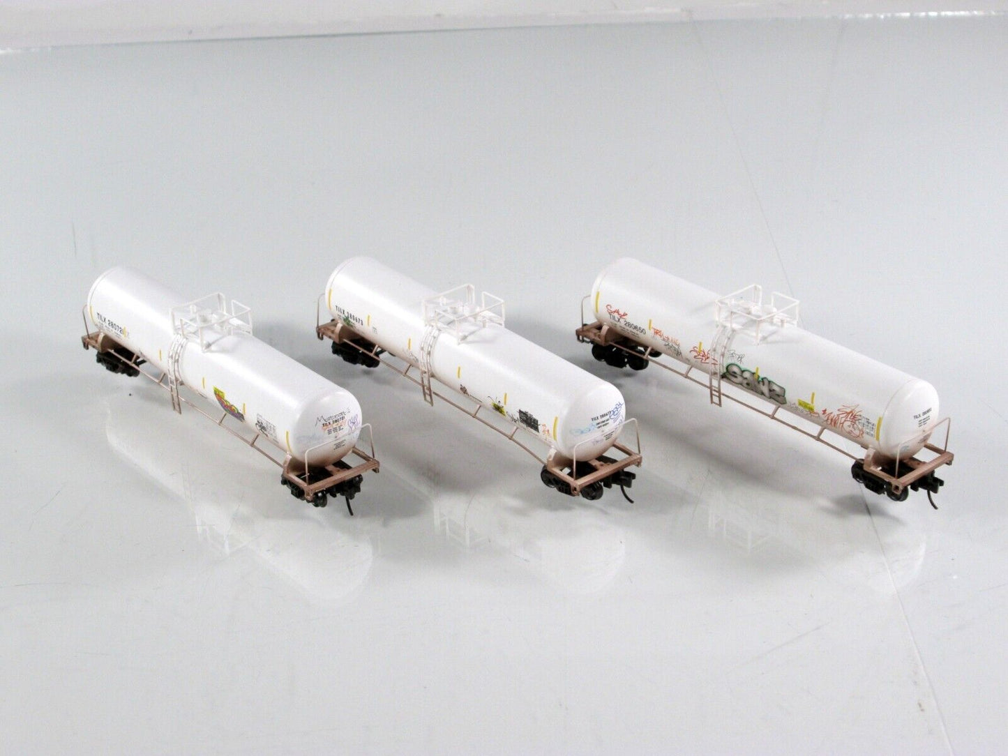 N Scale *TILX* Weathered & Graffiti 56' Tank Car Set Micro Trains 98305059 *RARE