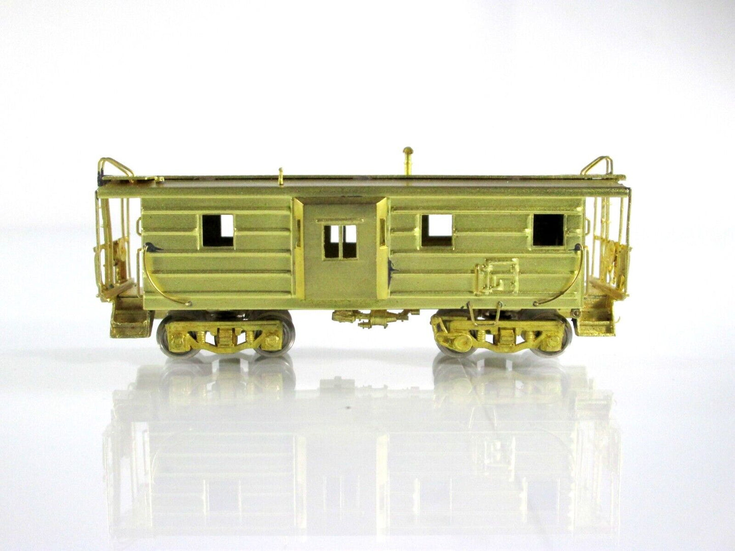 N Scale BRASS Milwaukee Road Bay Window Ribbed-Side Caboose -- Overland OMI-2828