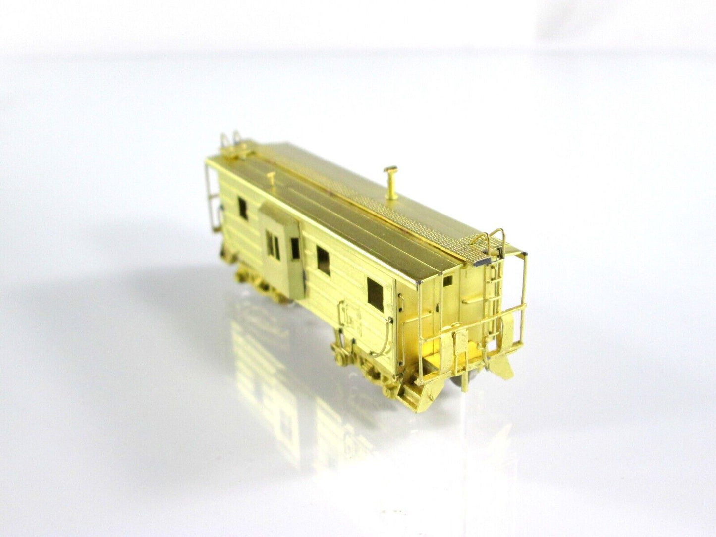N Scale BRASS Milwaukee Road Bay Window Ribbed-Side Caboose -- Overland OMI-2828