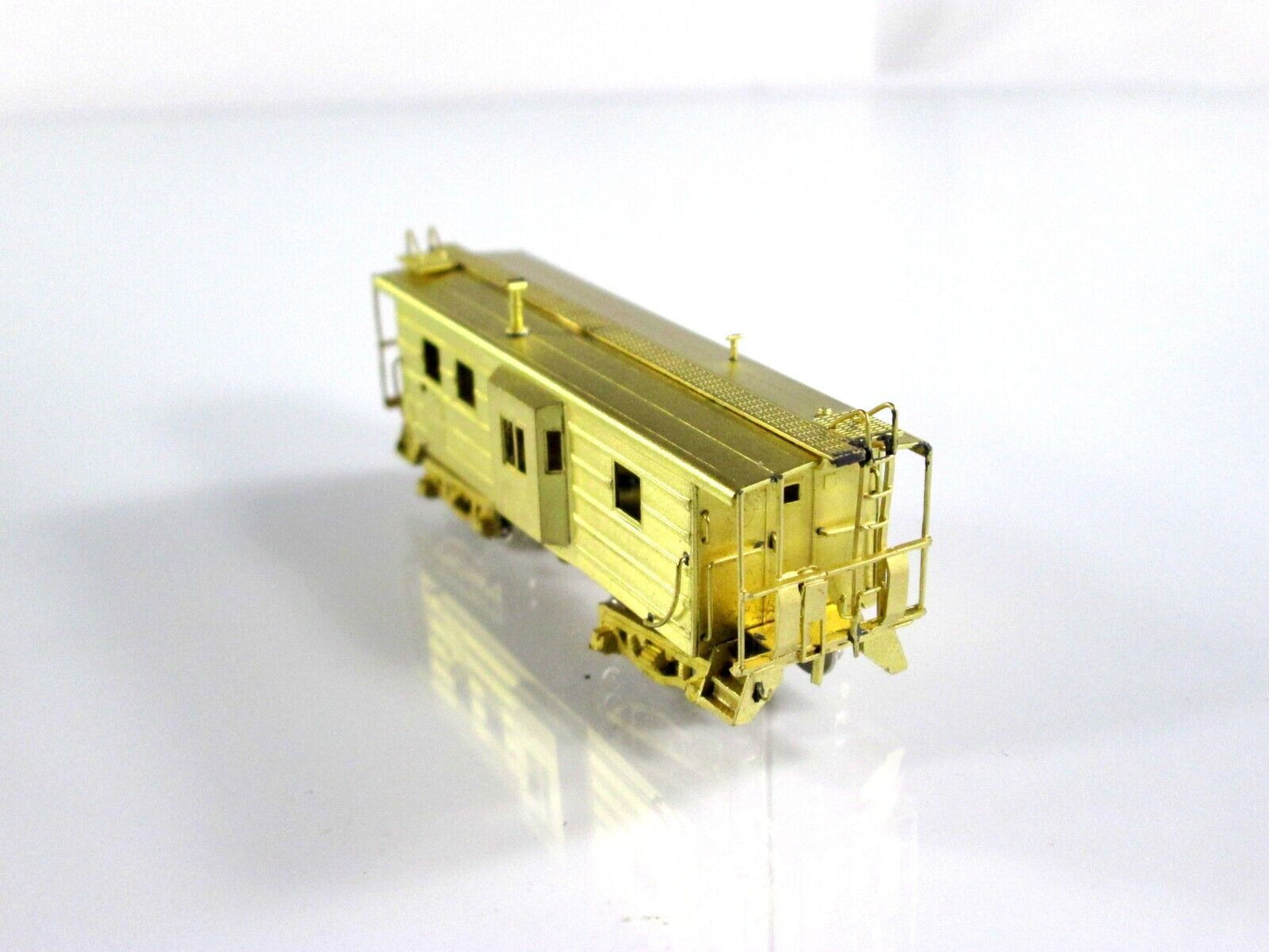 N Scale BRASS Milwaukee Road Bay Window Ribbed-Side Caboose -- Overland OMI-2828