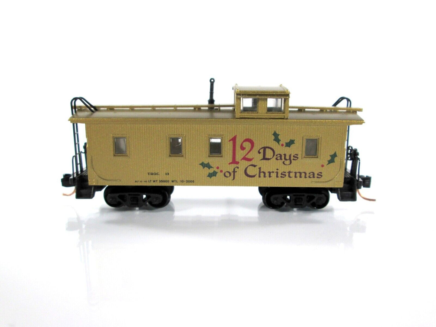 N Scale ***12 DAYS of CHRISTMAS*** 34' Wood Caboose ----- Micro Trains 05100250