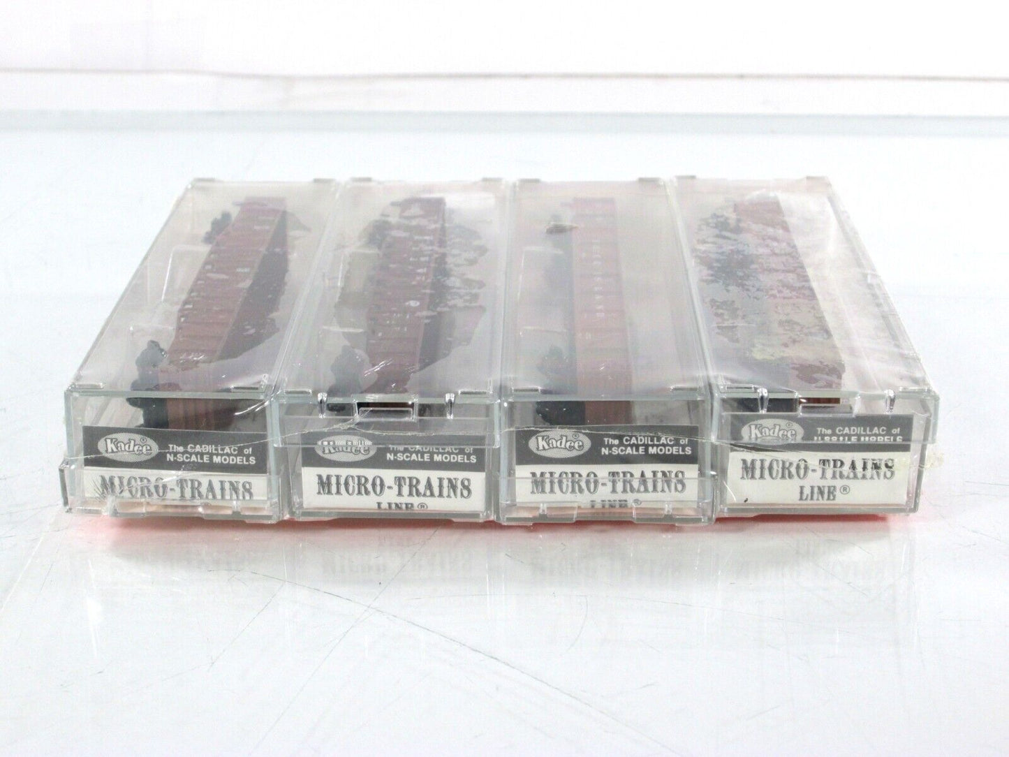 N Scale ***CB&Q ,  RI ,  PRR ,  GTW*** Gondola 4-Pack - Kadee Micro Trains 60022