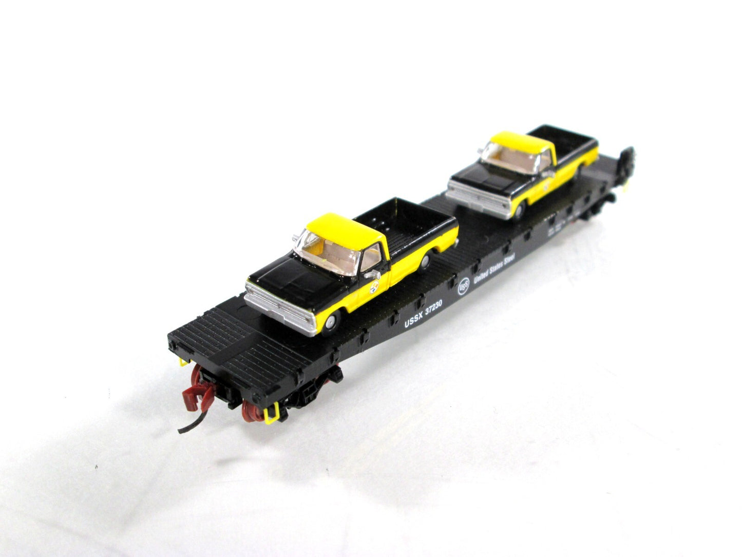 N Scale ***US STEEL*** Flat Car w/ Ford Pickup Load - Micro Trains NSE 23-18