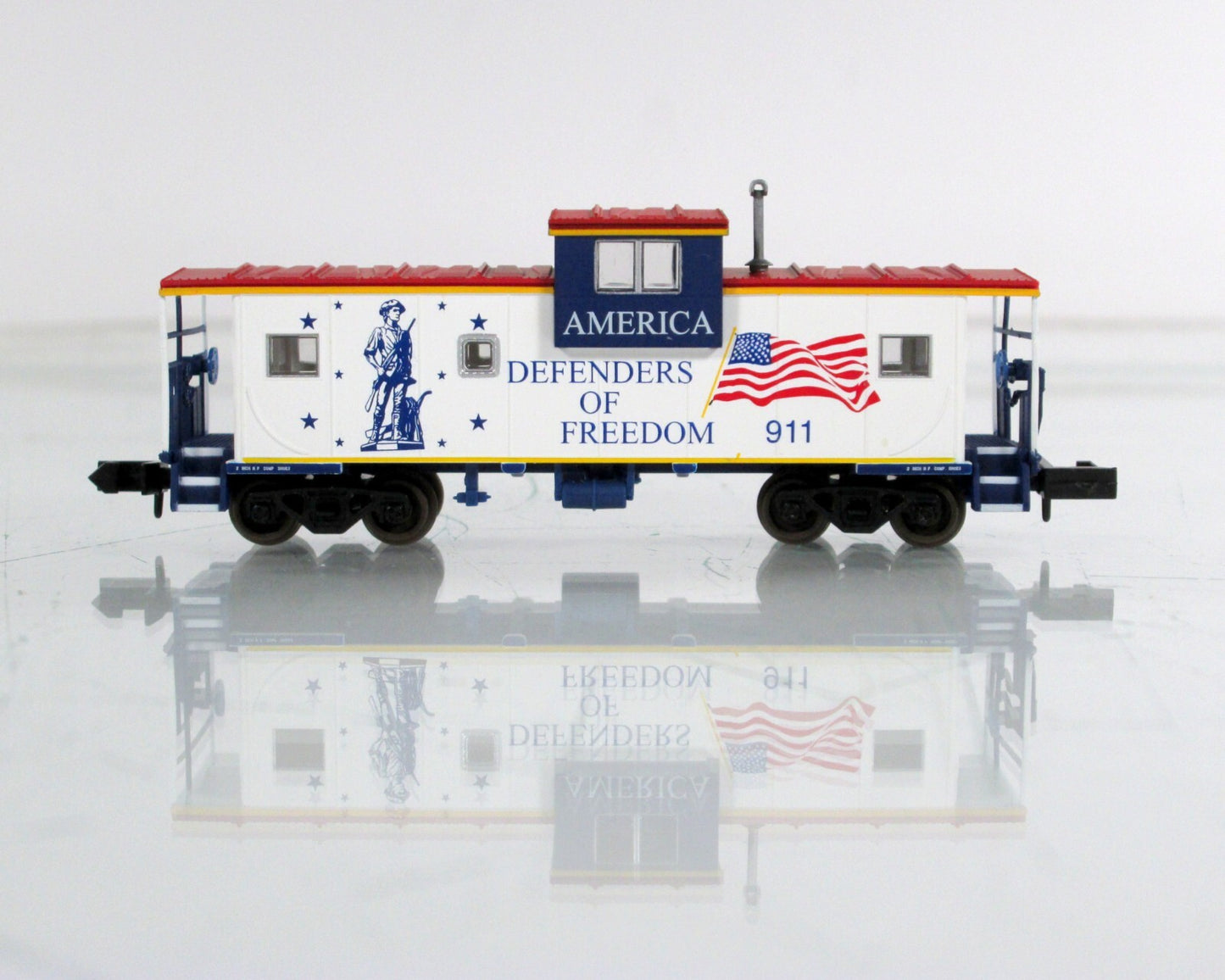 N Scale ***SPIRIT Of AMERICA   DEFENDERS of FREEDOM*** Caboose 911 -Atlas 30461