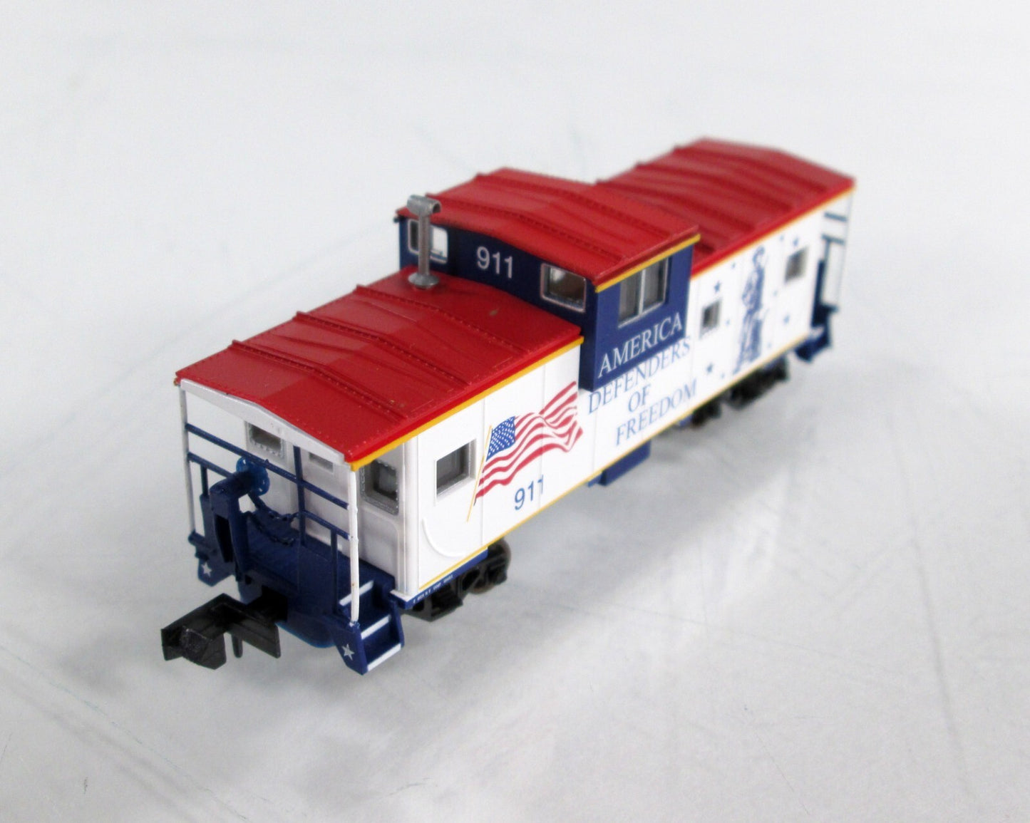 N Scale ***SPIRIT Of AMERICA   DEFENDERS of FREEDOM*** Caboose 911 -Atlas 30461