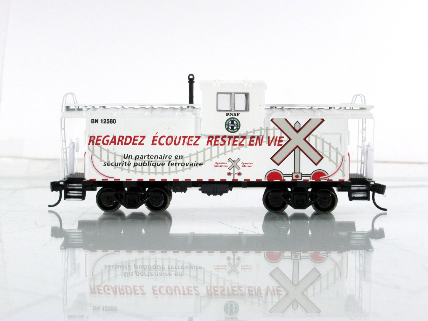 HO Scale **BNSF - Mexico** Operation Lifesaver Caboose, BN 12580 - Athearn 75236