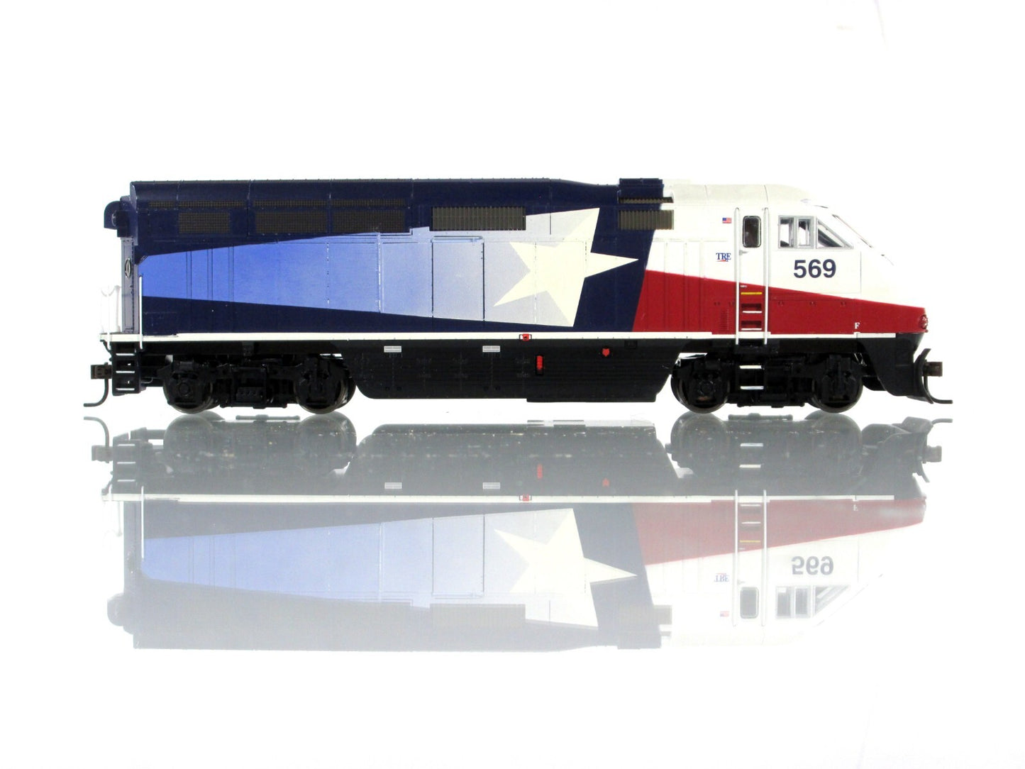 HO Scale ***DALLAS TRINITY RAIL  EXPRESS*** F59PHI, TRE #569 ------ Athearn 2622