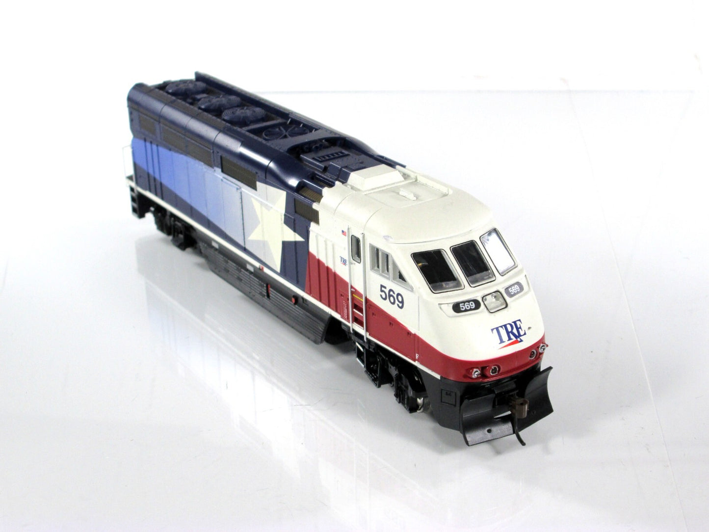 HO Scale ***DALLAS TRINITY RAIL  EXPRESS*** F59PHI, TRE #569 ------ Athearn 2622