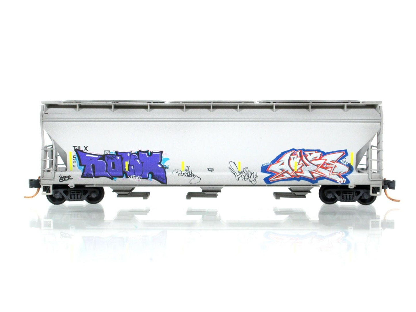 N Scale **POW-MIA** Graffiti Covered Hopper, TILX 517821 - Micro Trains 09444400
