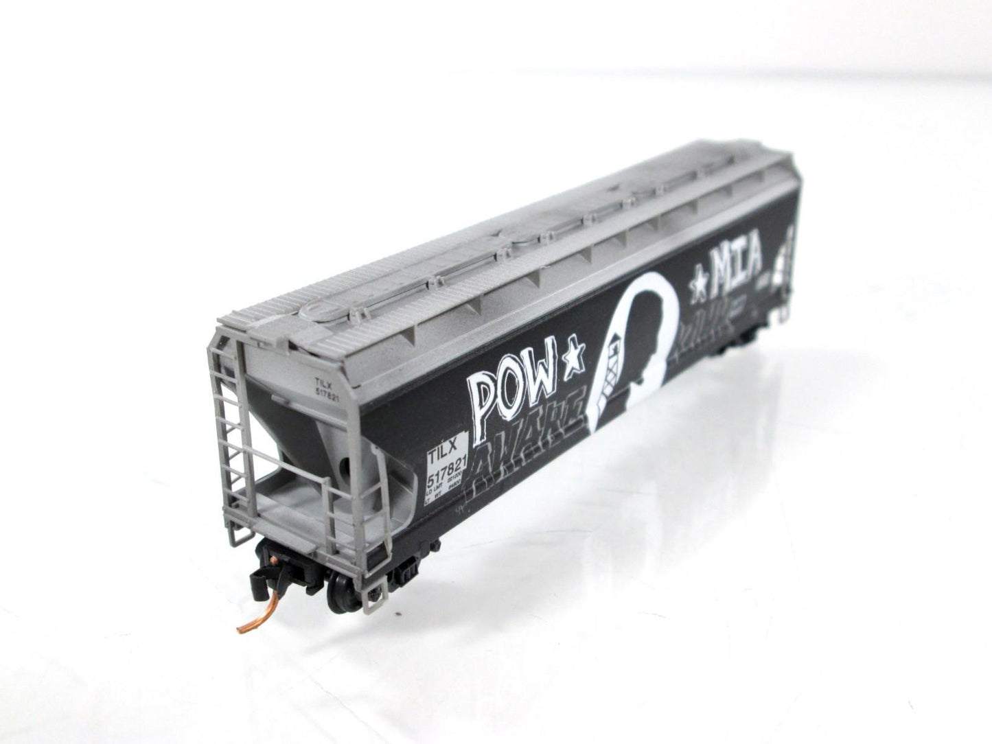 N Scale **POW-MIA** Graffiti Covered Hopper, TILX 517821 - Micro Trains 09444400