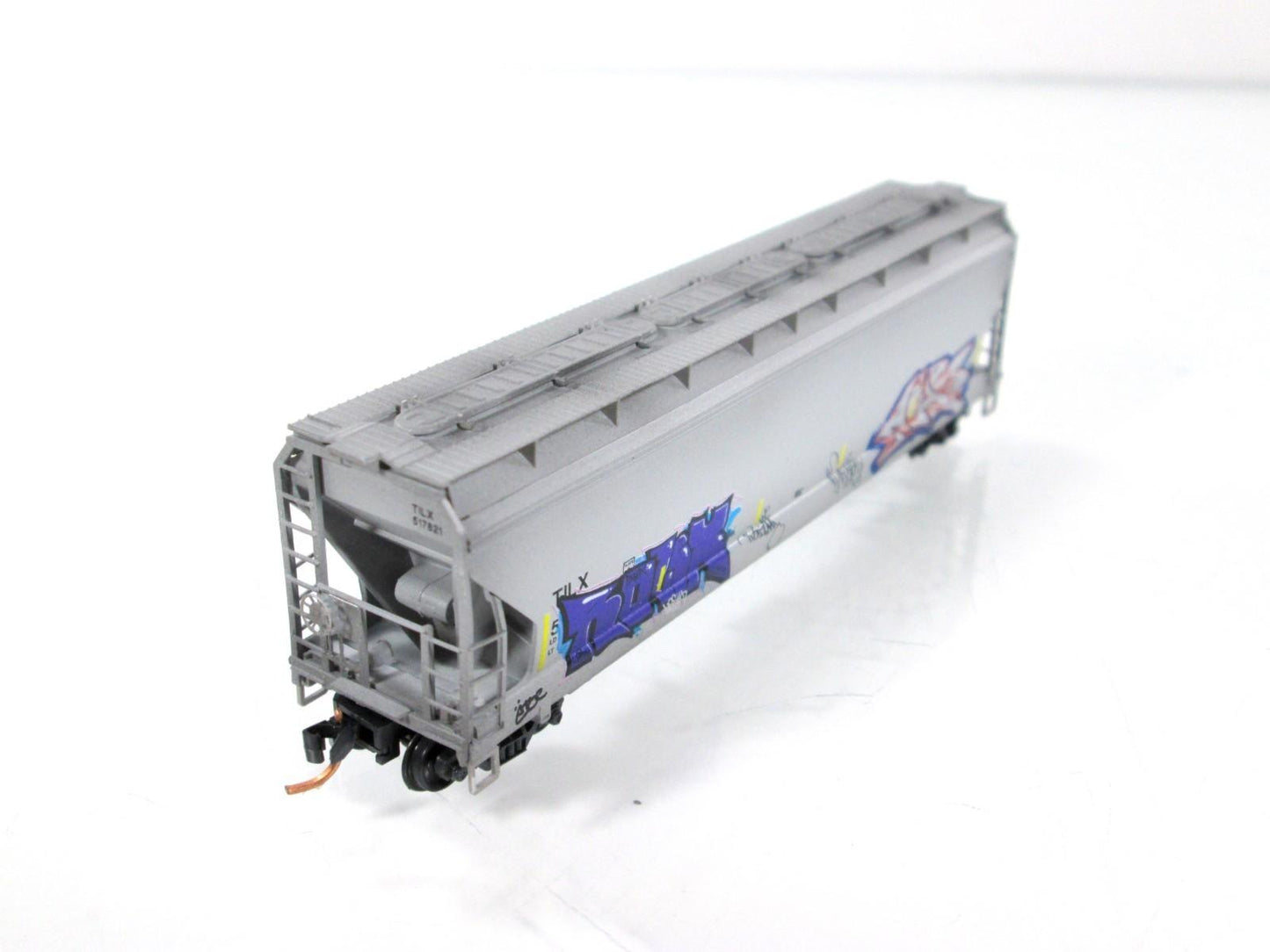 N Scale **POW-MIA** Graffiti Covered Hopper, TILX 517821 - Micro Trains 09444400