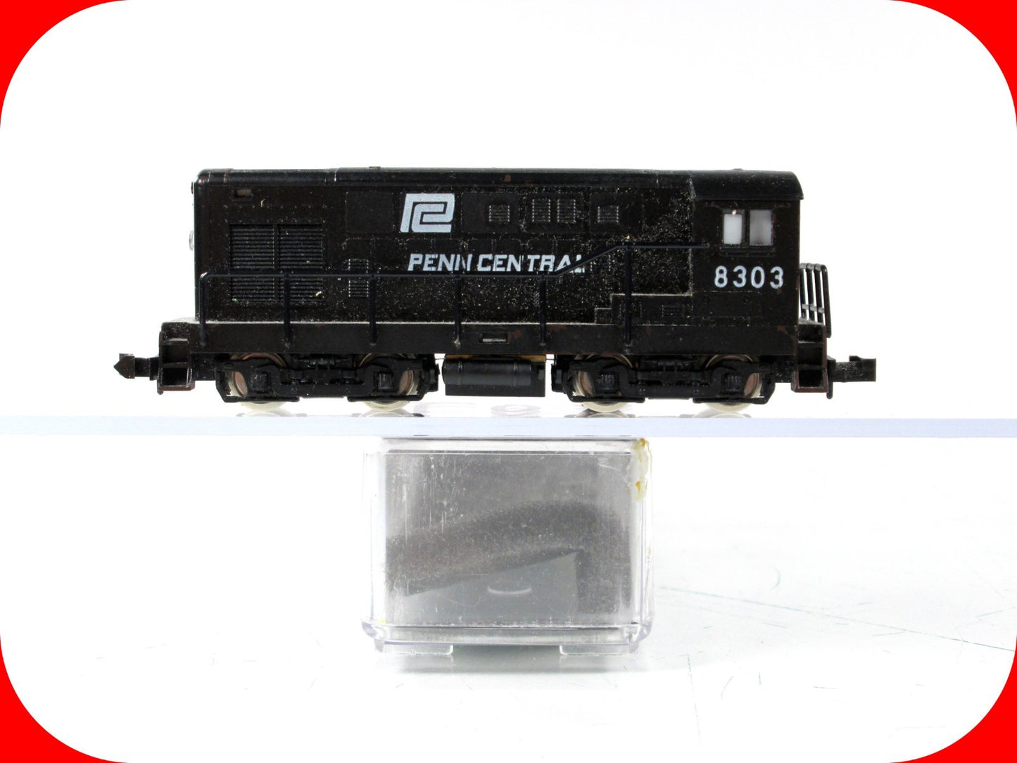 N Scale ***PENN CENTRAL*** FM H12-44 Diesel Switcher Locomotive, PC 8303 -- Trix
