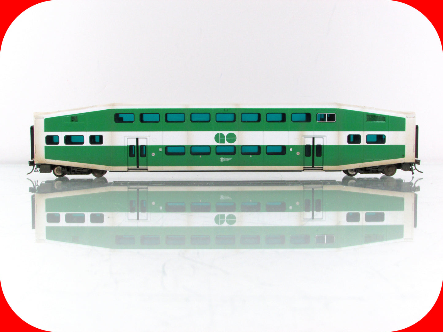 HO Scale ***GO TRANSIT*** Bombardier Passenger Coach, Weathered - Rapido Trains