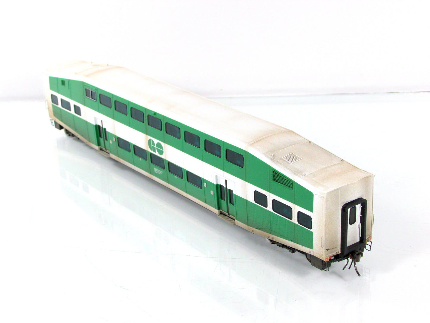 HO Scale ***GO TRANSIT*** Bombardier Passenger Coach, Weathered - Rapido Trains