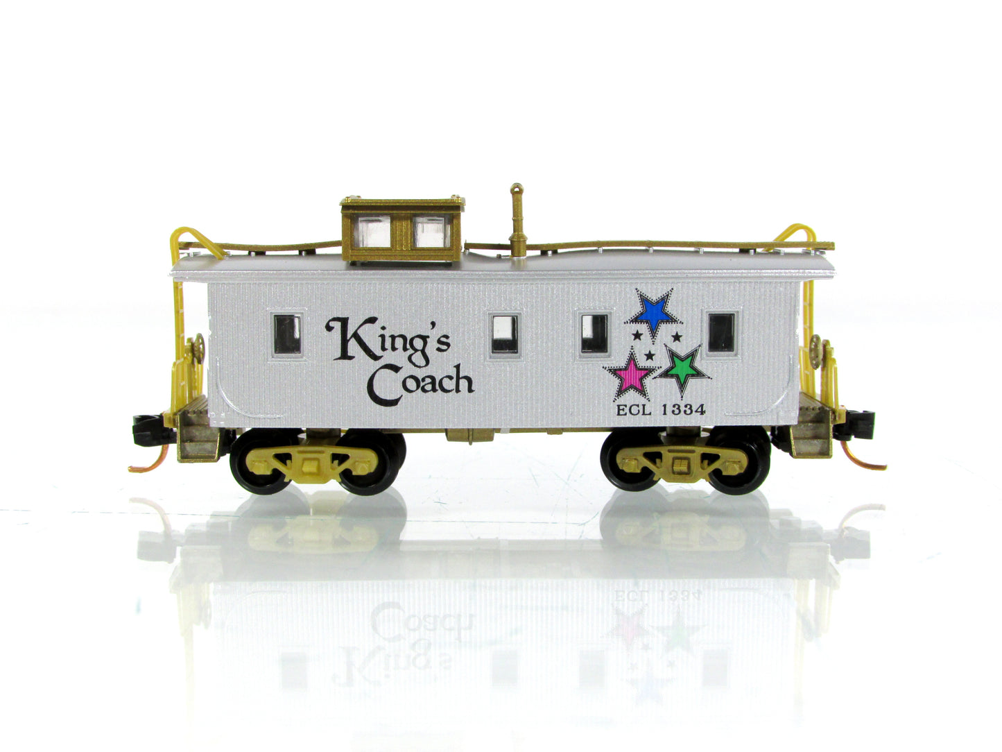 N Scale **EAST CARAVAN LINES** CHRISTMAS Caboose - Micro Trains 05150009 *READ
