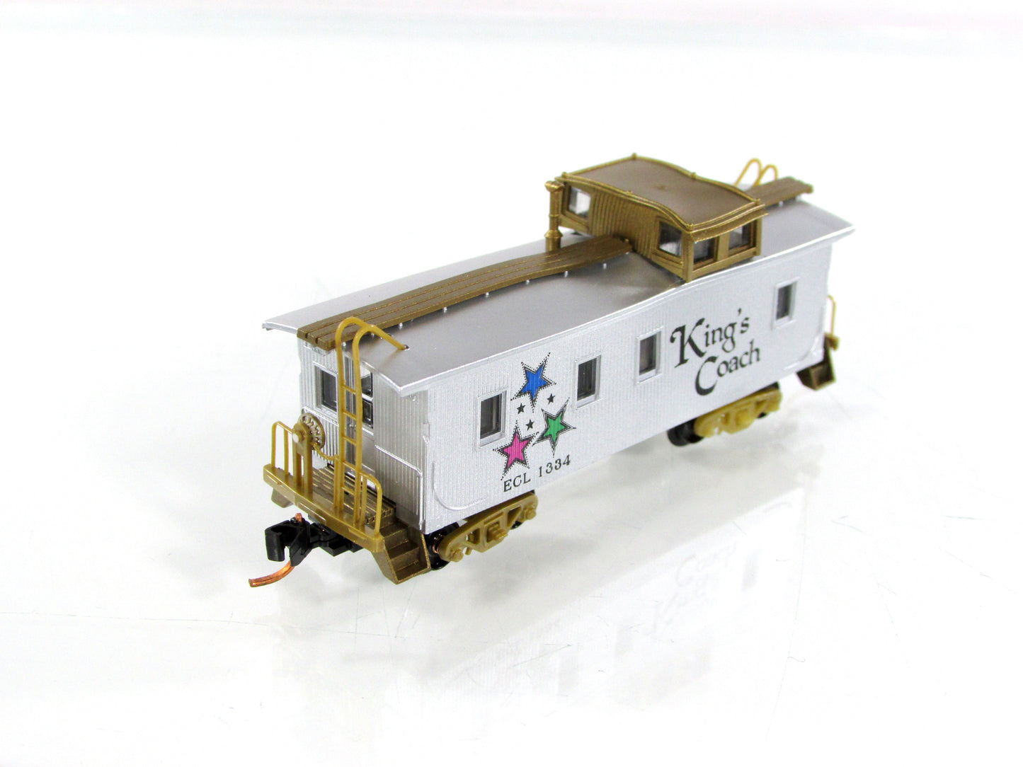 N Scale **EAST CARAVAN LINES** CHRISTMAS Caboose - Micro Trains 05150009 *READ